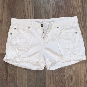 White distressed denim shorts